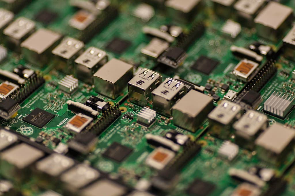 A Raspberry Pi circuit board representing modern technology and engineered tools